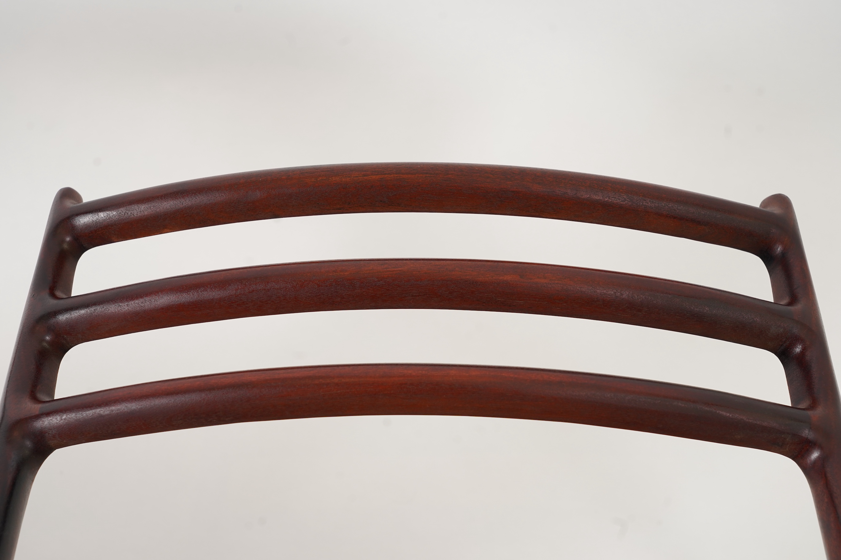 Niels Otto Møller (Danish, 1920-1982) for JL Møllers Møbelfabrik: A pair of 'Model 62' carver chairs